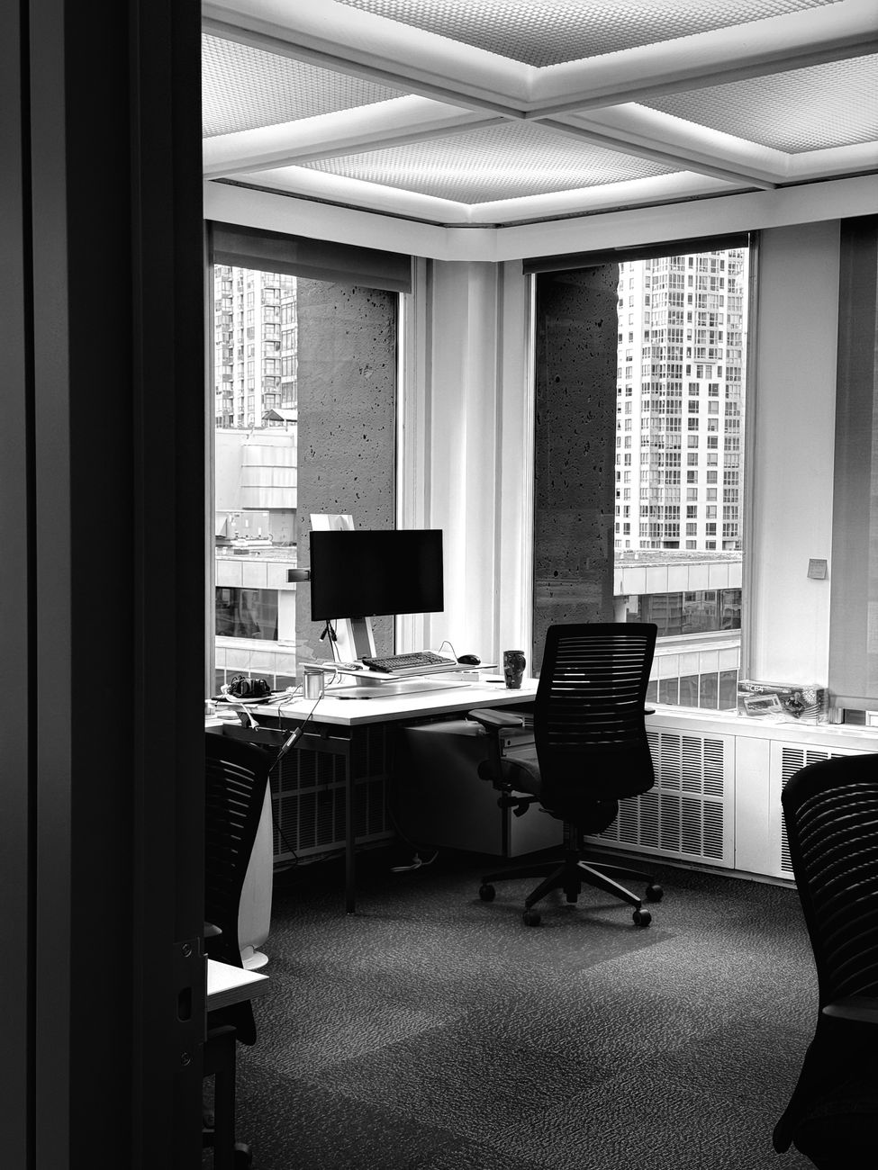 Corporate boardroom high-end backdrop for PolityKit compliance and policy drafting services